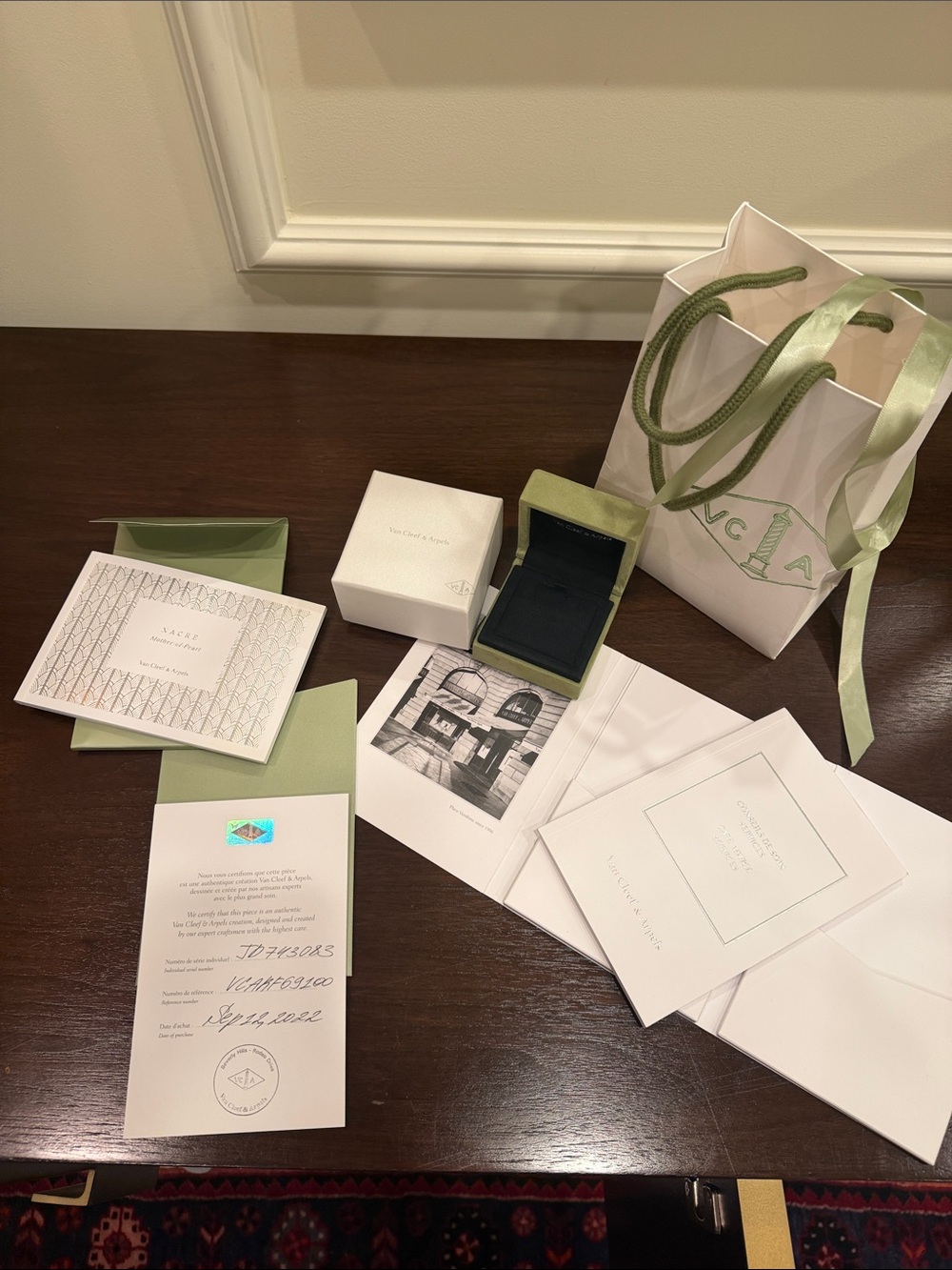 Van Cleef & Arpels mint green jewelry box and branded bag set